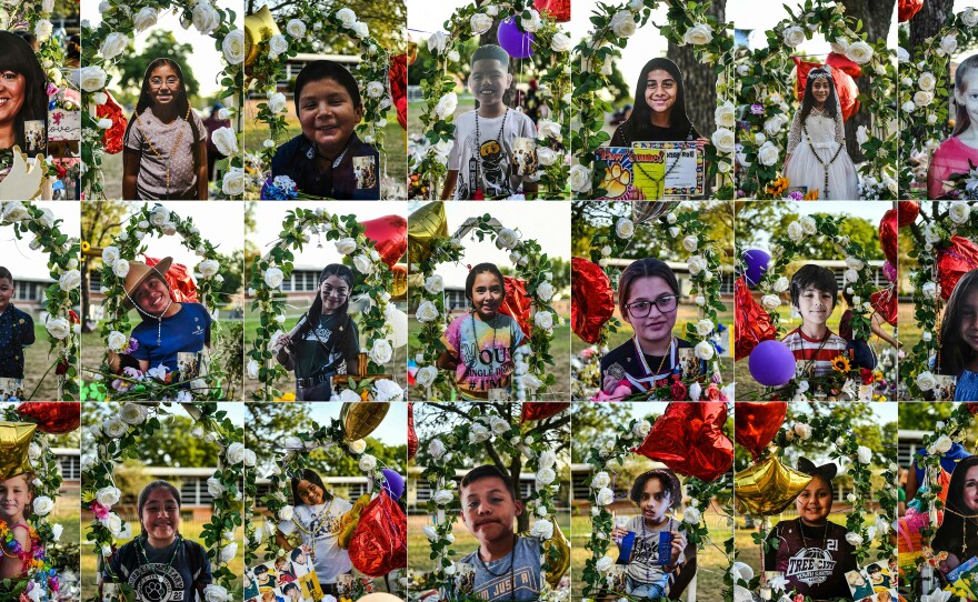 A combination of photos of 19 children and 2 teachers who died in the mass shooting are displayed at a makeshift memorial at Robb Elementary school in Uvalde, Texas.