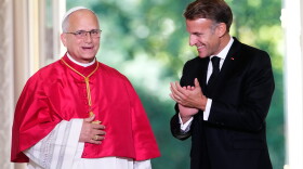 Pope Leo XIV and French President Emmanuel Macron attend a joint statement at the Élysée Palace in Paris, Friday.