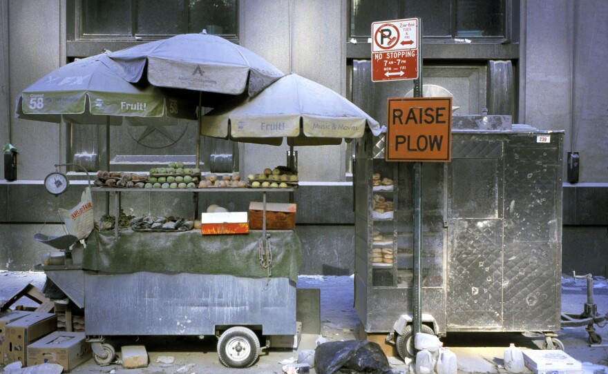 A fruit cart sits abandoned and dust-covered in the Financial District on Sept. 12, 2001.