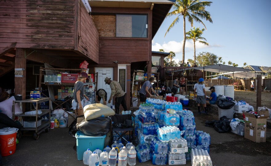 Donated items for those affected by the wildfires are sorted at Buzz's Wharf in Maalaea Harbor.