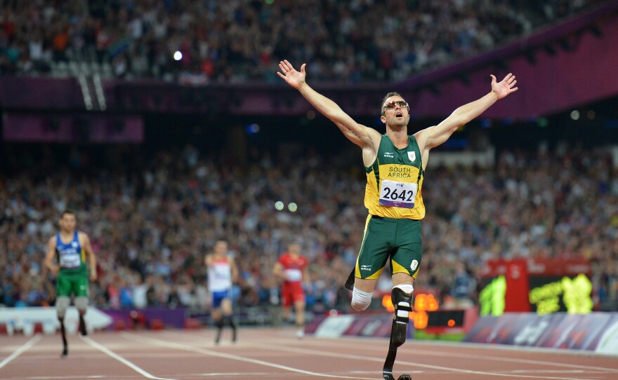 Oscar Pistorius, seen here winning a gold medal at the London 2012 Paralympic Games, faces charges that he murdered his girlfriend. Pistorius also competed in the 2012 Summer Olympics.