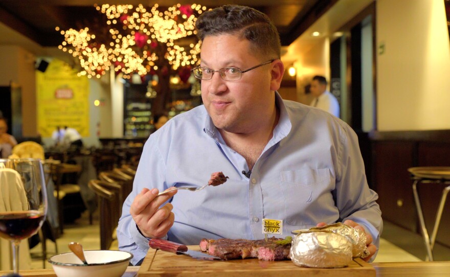 Jorge tries the famous Black Onyx steak at Palominos restaurant in Tijuana, Mexico. 