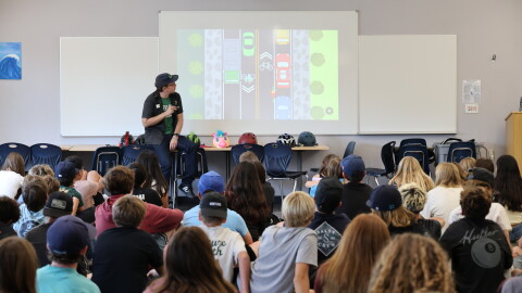 Kevin Baross, the San Diego County Bike Coalition's education manager, leads a bike safety presentation at Oak Crest Middle School in Encinitas on Aug. 17, 2026.