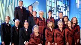 The cast of "Lawrence Welk Precious Memories" gathers for an official group photo. Bottom row, left to right: Tom Netherton, Dick Dale, Jack Imel, Jo Ann Castle, Kathy Lennon, Janet Lennon, Mimi Lennon. Back row, left to right: Ken Delo, Bob Ralston, Joe Feeney, Norma Zimmer, Mary Lou Metzger, Guy Hovis, Ralna English and Gail Farrell.