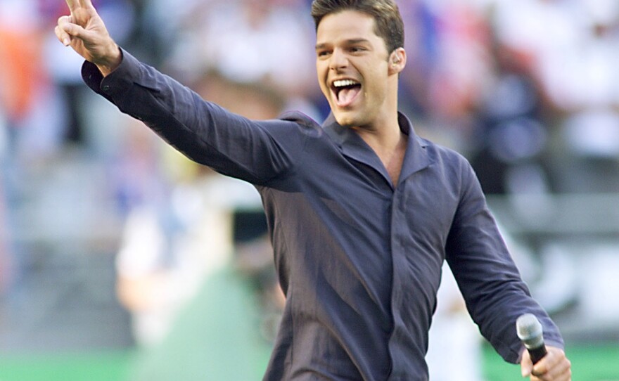 Ricky Martin performs at the Stade de France near Paris, just before the1998 World Cup final match between Brazil and France and his rise to superstardom.