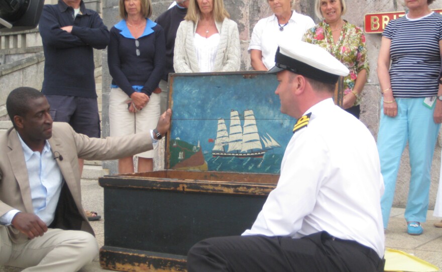 Lennox Cato examines a tarred and painted sailor’s coffer.