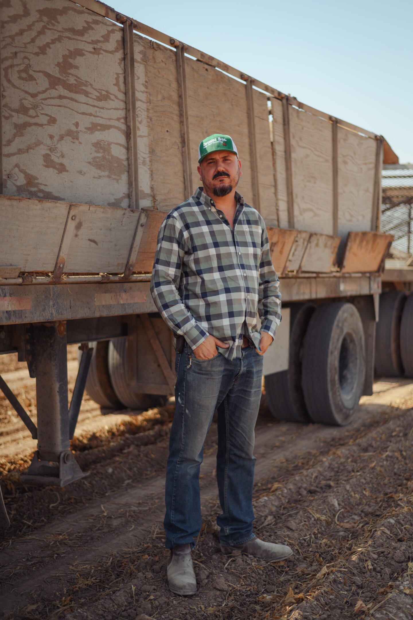Armando Gonzalez stands for a portrait in one of the Abatti family's fields near El Centro in Imperial County on July 16, 2025. Gonzalez has been hauling sugarbeets since he was 18, and his family has been working with the Abatti's for more than 40 years.