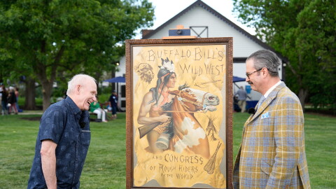 Nicho Lowry (right) appraises a 1902 Buffalo Bill’s Wild West poster, in Littleton, Colorado. ANTIQUES ROADSHOW “Denver Botanic Gardens Chatfield Farms, Hour 1” airs Monday, April 7 at 8/7C PM on PBS.