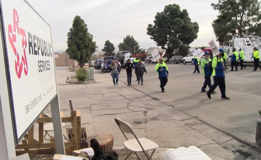 Sanitation workers picket outside Republic Services offices in Chula Vista, Dec. 21, 2021.