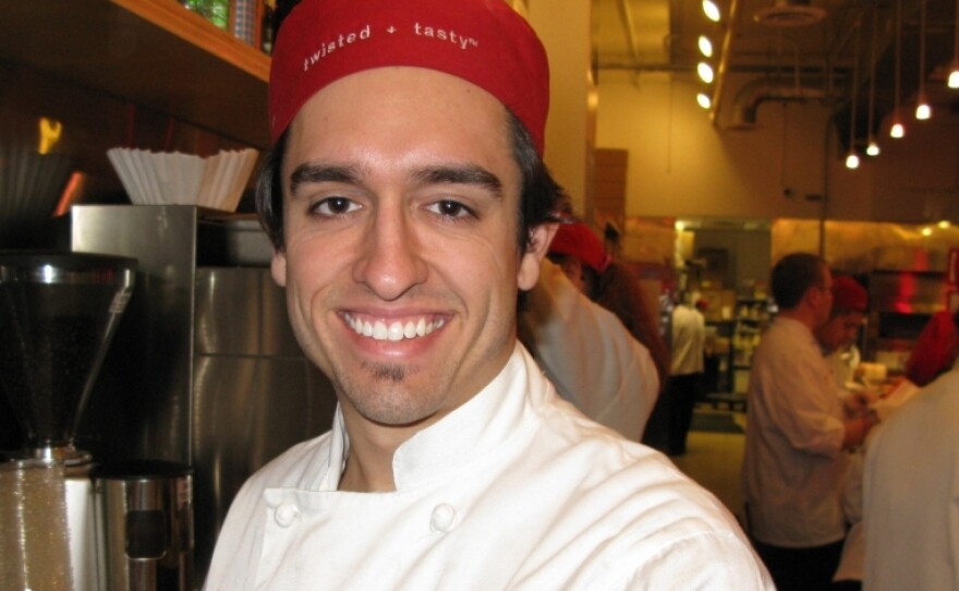 Brandon Smith is graduating from Columbia College in Chicago. He works part time at a sandwich shop downtown. Smith's college loans total $98,000, and he expects them to go higher.