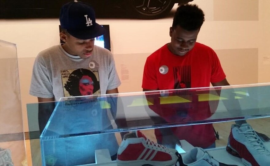 Ritchy Issac (left) and Myles Linton (right) consider themselves part of sneaker culture, the subject of an exhibit now on display at the Brooklyn Museum.