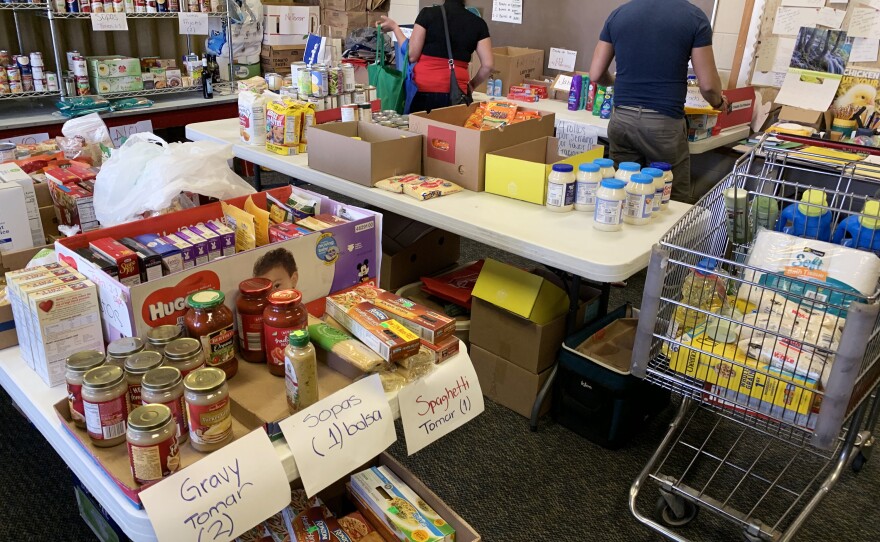 A food pantry was set up at First Presbyterian Church to help feed the men, who aren't permitted to work legally, and their families.