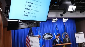 Acting Attorney General Todd Blanche speaks as FBI Director Kash Patel listens during a news conference at the Justice Department on Tuesday in Washington.