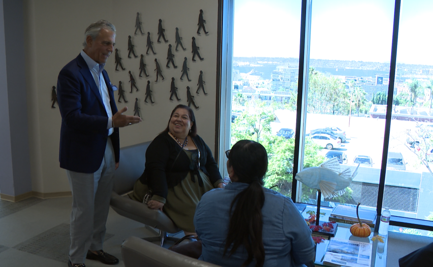 Manpower San Diego CEO Phil Blair talks with guests in the Manpower offices on Oct. 1, 2025 in San Diego, Calif.