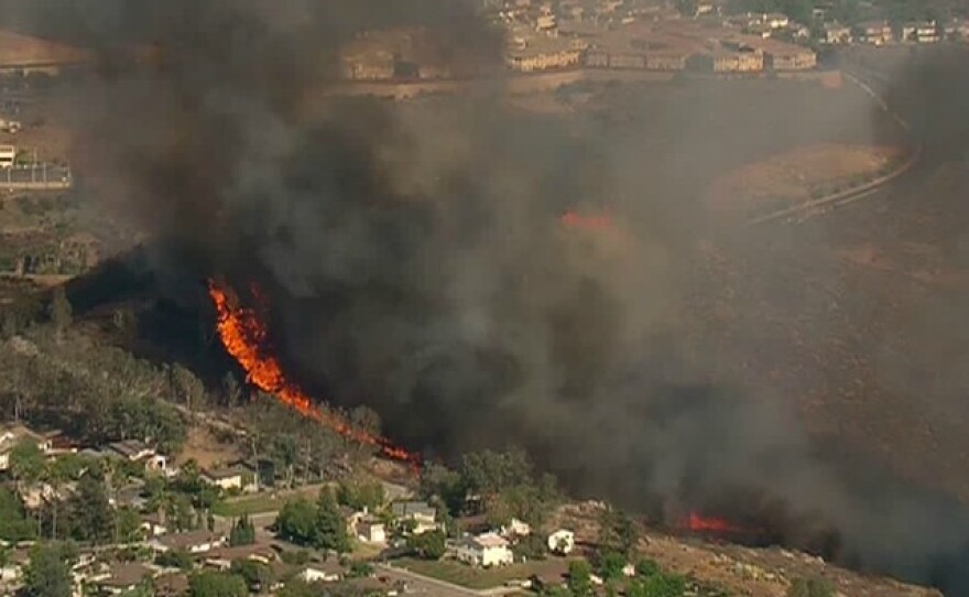 A view of a fire burning in Spring Valley, August 17, 2016.