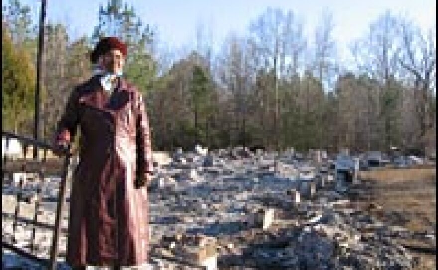 Hazel White, 73, is a lifetime member of Galilee Baptist Church. The small church in Panola, Ala., burned to the ground in a suspected arson fire. All that's left is the twisted iron railing and front steps.