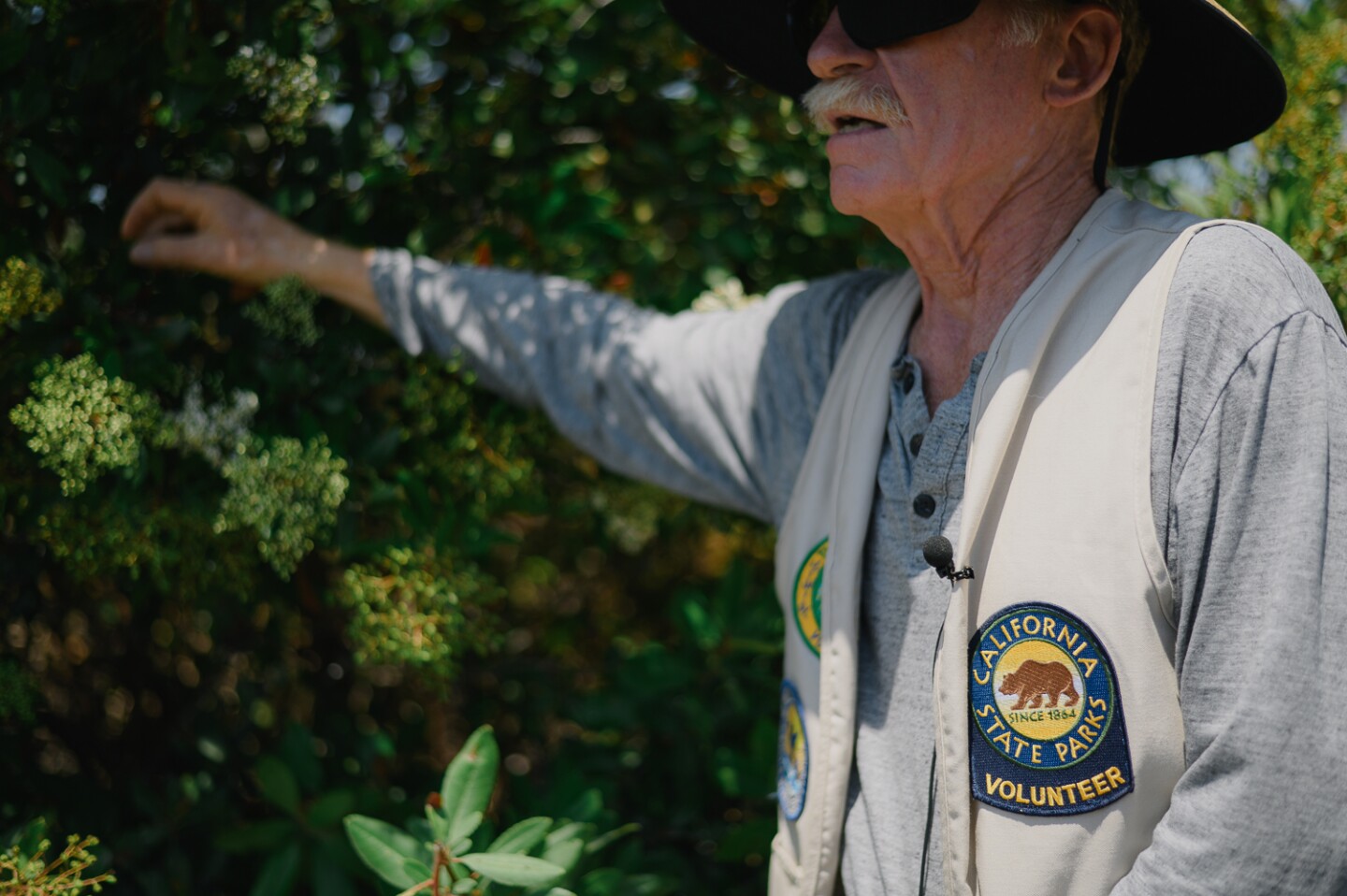 Volunteer docent Ron Peterson leads his tour, “An Eye-Opening Experience Without Sight,” through the Tijuana River Estuary in Imperial Beach, California on August 3, 2024.