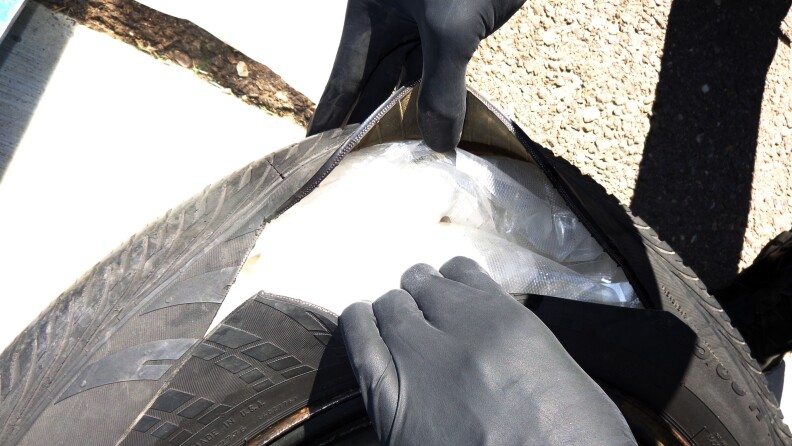 Multiple packages of methamphetamine concealed inside the spare tire of an SUV stopped by Border Patrol agents at the checkpoint on Interstate 8 in Pine Valley on Aug. 8, 2020.