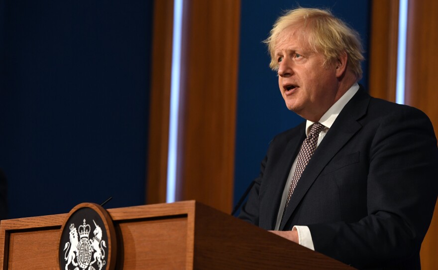 Britain's Prime Minister Boris Johnson gives an update on relaxing restrictions imposed on the country during pandemic at a virtual press conference at Downing Street on July 5.