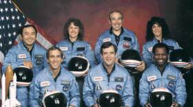 Space Shuttle Challenger crew members (Back, L-R) Mission Specialist Ellison S. Onizuka, Teacher-in-Space participant Sharon Christa McAuliffe, Payload Specialist Greg Jarvis and mission specialist Judy Resnick. (Front, L-R) Pilot Mike Smith, commander Dick Scobee and mission specialist Ron McNair.