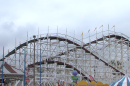 The Giant Dipper Roller Coaster in Belmont Park is surrounded by overcast weather during June gloom in Mission Beach, San Diego, CA on June 14, 2023.
