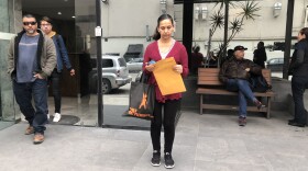 Maria Davis-Cherry is pictured in front of a cancer clinic in Tijuana in this photo taken in 2019.  
