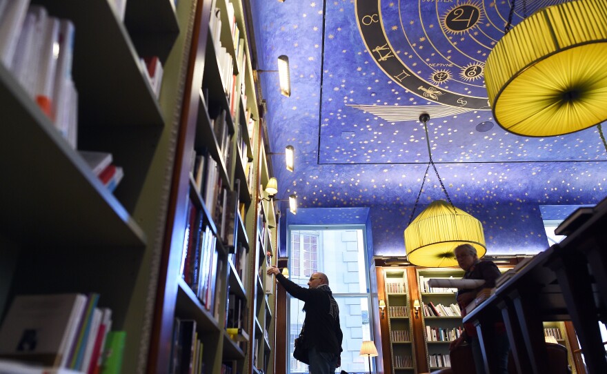 Fans are celebrating World Book Day Thursday. Here, a man browses through books at the Albertine, a French bookstore and library at the French Embassy in New York.