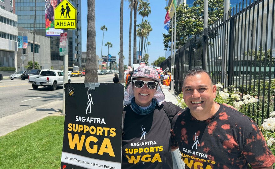 Elizabeth Mihalek and Vincent Amaya are background actors and members of SAG-AFTRA. They picketed in solidarity with striking writers outside Netflix this week.