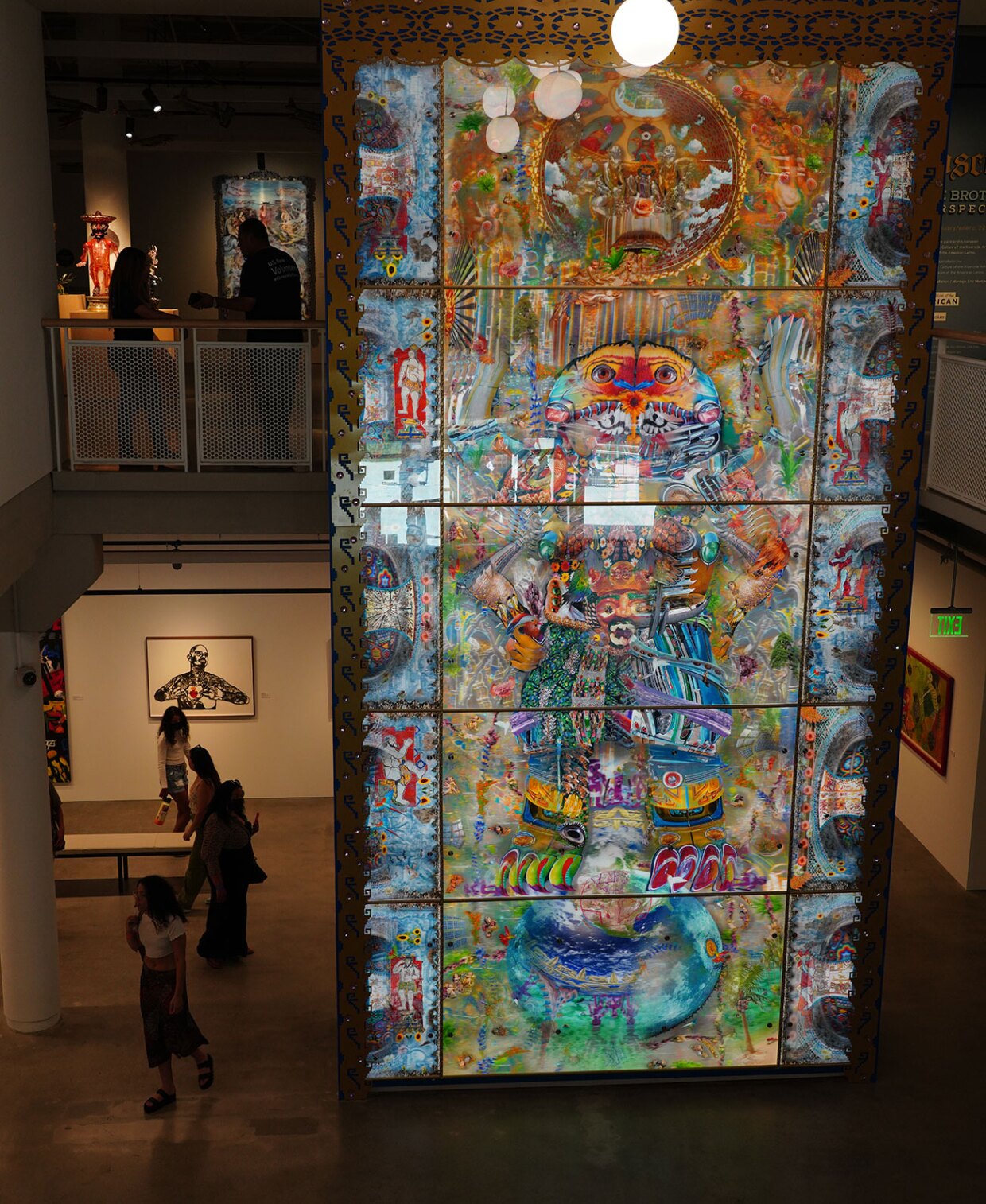 A new two-story, back-lit mural by the de la Torre Brothers uses the lenticular method to make the image transform as a viewer moves. The work is shown on view at The Cheech in Riverside, Calif., in an undated photo.