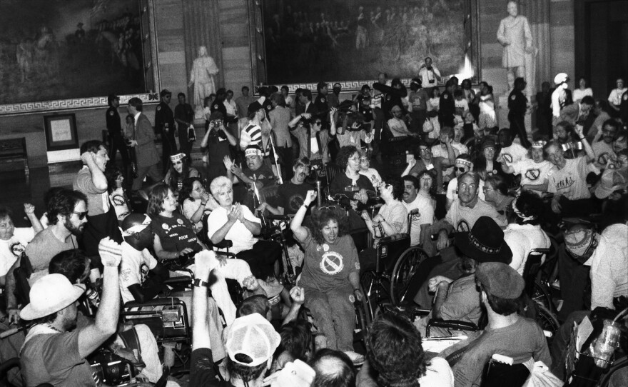 ADAPT (American Disabled for Accessible Public Transit) leader Stephanie Thomas in the center of a sit-in at the US Capitol Rotunda on March 13, 1990, in Washington, D.C.