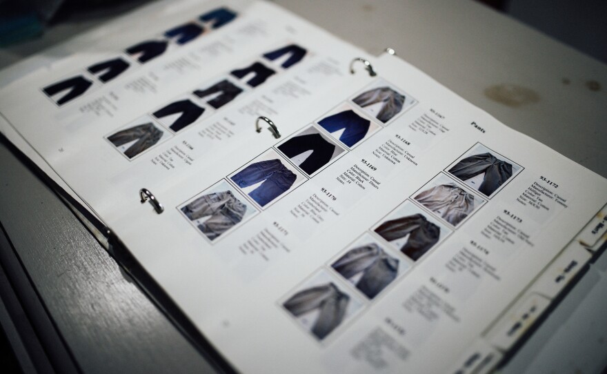 Family members received a binder of cataloged clothes and personal objects found at the Flight 93 crash site. Lori Guadagno went through it to see if she could identify anything that belonged to her brother.