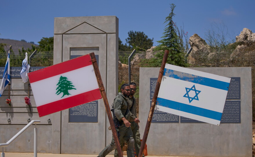 Israeli soldiers are seen at a memorial site on the border with Lebanon in northern Israel, Sunday, June 28, 2026.