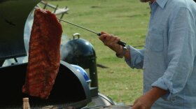 Steven Raichlen, host of Primal Grill, preparing ribs. 
