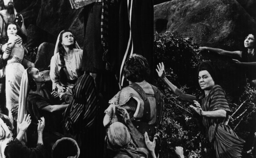 Charlton Heston starred as Moses in <em>The Ten Commandments </em>in 1956. Cecil B. DeMille's film "was really a Cold War film," says professor William Romanowski. "And he, at the beginning of the film, comes out from behind a curtain and stands on a stage and announces that this is the story of the beginning of the birth of freedom."