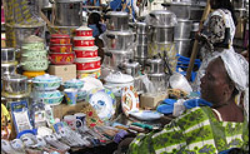 Vendors in Kinshasa's central market offer Chinese-made good for sale.