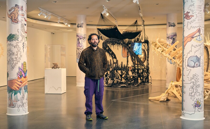 Artist Guadalupe Maravilla photographed in one of the galleries of his show "Tierra Blanca Joven."
