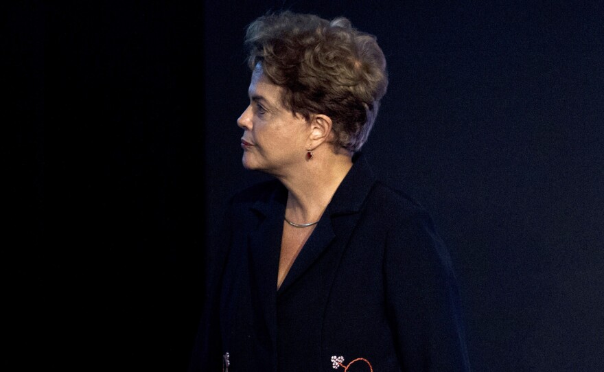 Embattled Brazilian President Dilma Rousseff (shown here at the 21st International Construction Salon in Sao Paulo, Brazil, on Tuesday) was elected four months ago. Her administration has been hit hard by economic problems and a massive corruption scandal at the state oil company, Petrobras.