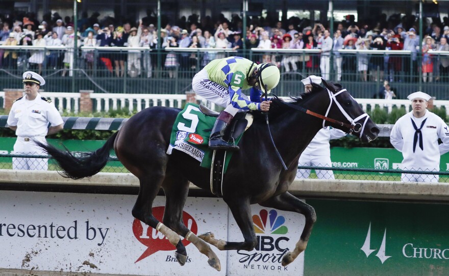 John Velazquez rides Always Dreaming to victory.