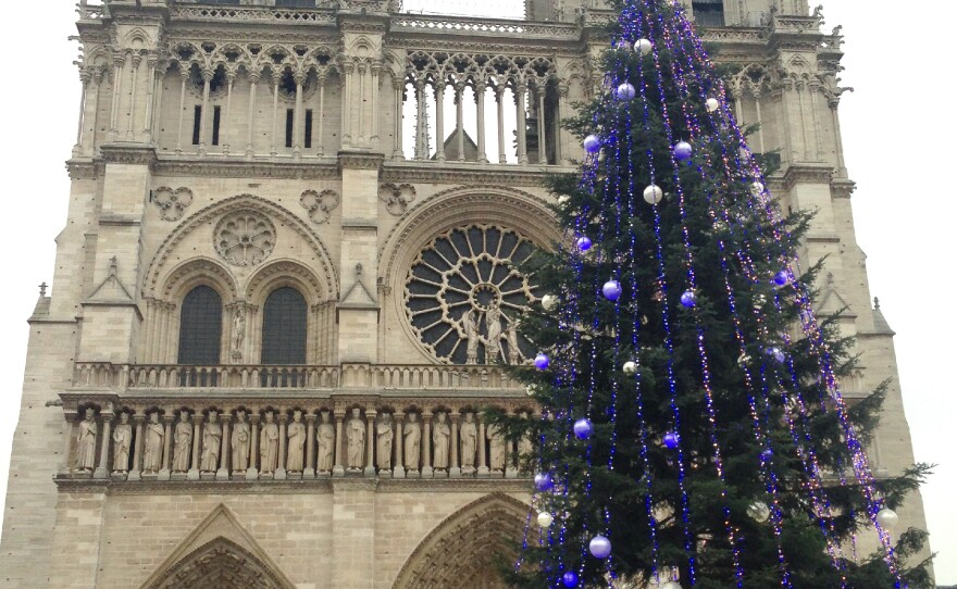 The Christmas tree outside of Paris' Notre Dame Cathedral. Traditionally it is purchased by French groups and worshipers. But this year, for the first time, it was a gift from the Russian government.