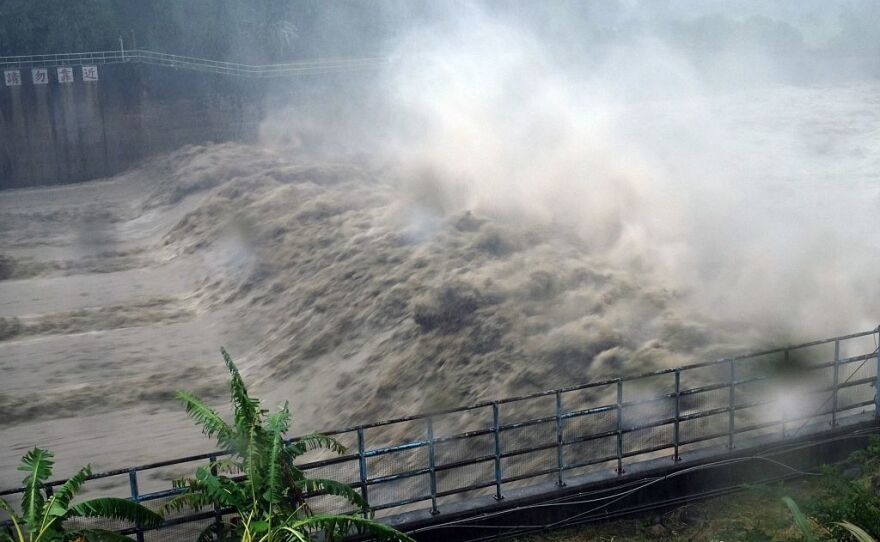 Waters churned in the Jhihtan Dam in Xindian district, New Taipei City, as Typhoon Megi hit eastern Taiwan.