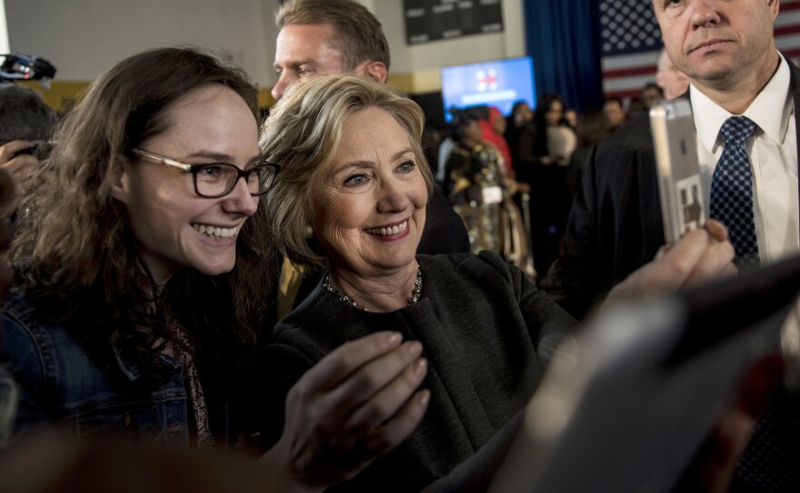 Hillary Clinton stops for a selfie with a supporter following a Women for Hillary Town Hall meeting in New York City.