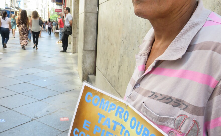 Carlos Roberto Gomes buys gold — and human hair — on a street corner in downtown Porto Alegre.