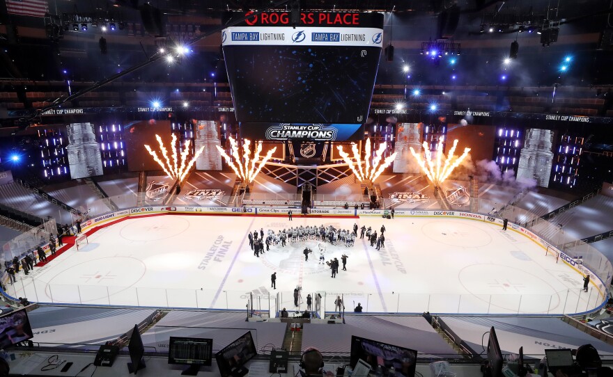 The Tampa Bay Lightning celebrate winning the Stanley Cup on Monday in Edmonton, Canada.