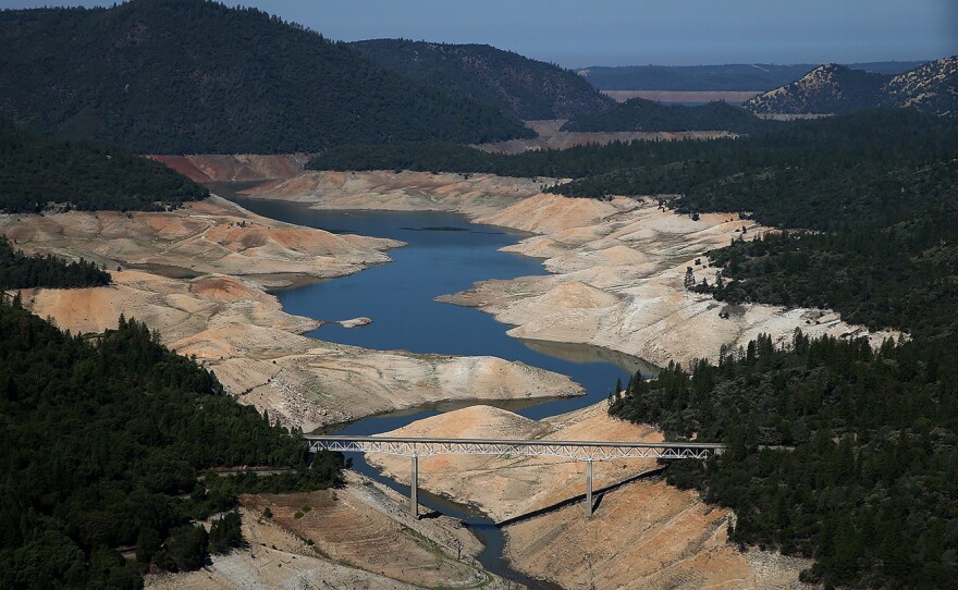 The Enterprise Bridge in Oroville, during severe drought in 2014 (left) and this April, during the week that the majority of the state's drought emergency is due to be lifted.