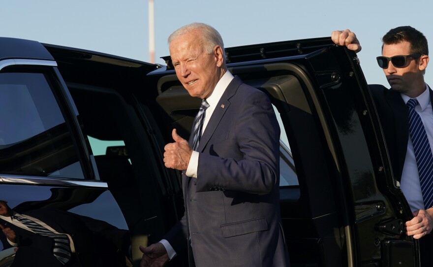 "We have to end COVID-19 not just at home, which we're doing, but everywhere," President Joe Biden said on June 9 during his stop at Royal Air Force Mildenhall in Suffolk, England, on the first leg of his European trip. Above: Biden steps into a motorcade vehicle after arriving at RAF Mildenhall.