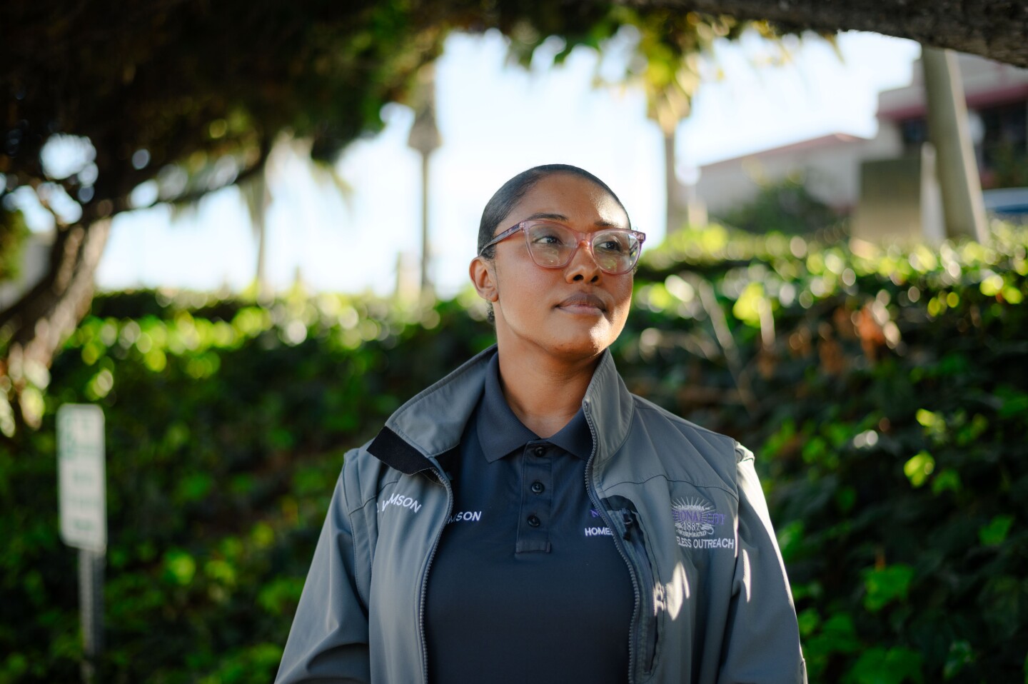 National City HOME team caseworker Qiana Williamson stands for a portrait outside City Hall on March 7, 2024.