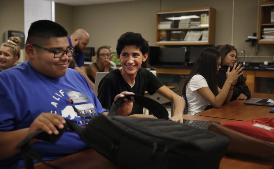 Angel prepares for computer class at Minto High School.