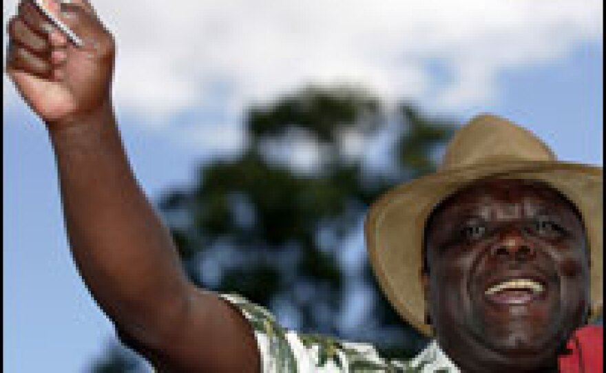 Presidential candidate Morgan Tsvangirai addresses a rally outside Harare on Thursday.