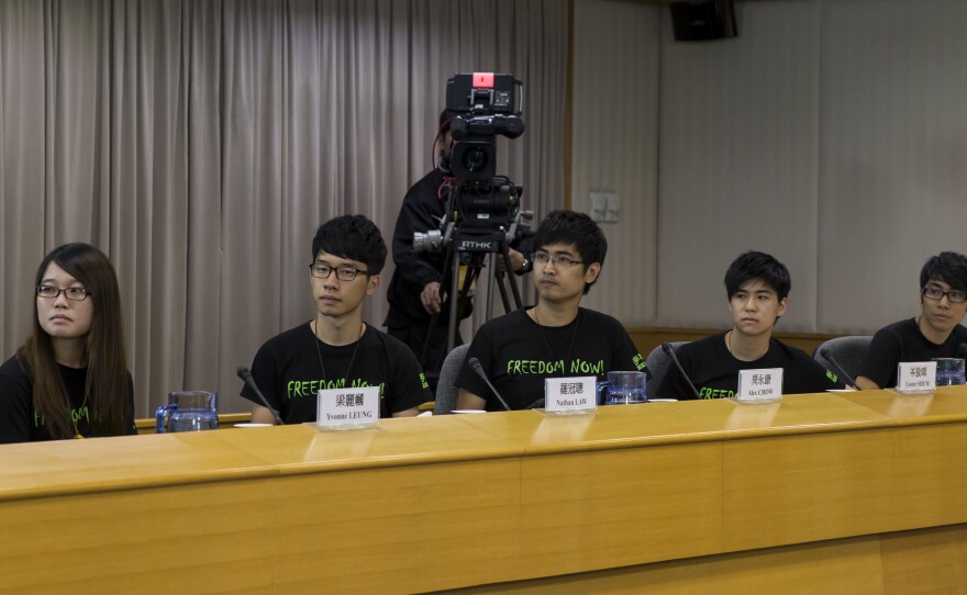 Hong Kong Federation of Students' Council members attend a meeting with senior Hong Kong government officials in Hong Kong on Tuesday.