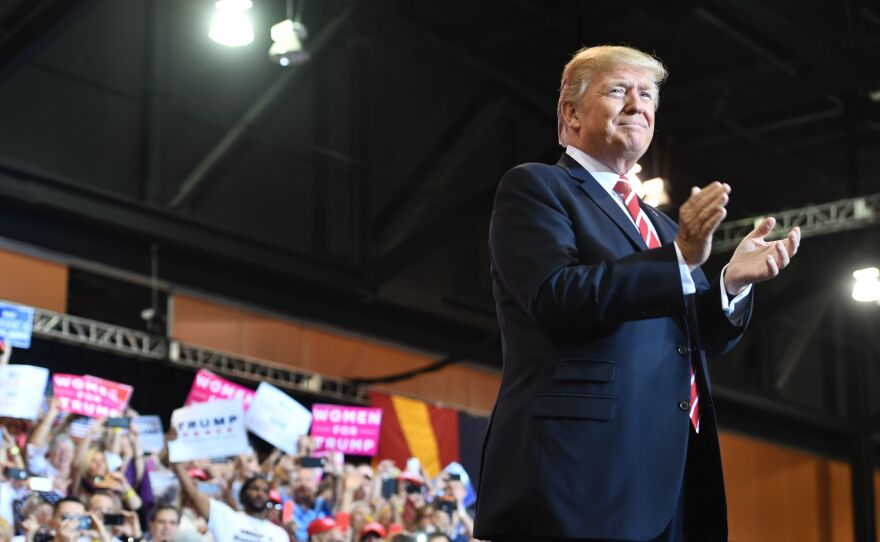 President Trump arrives at his campaign rally in Phoenix on Tuesday.